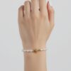 Bratara cu perle naturale si charm stea Bratara cu perle naturale si charm stea