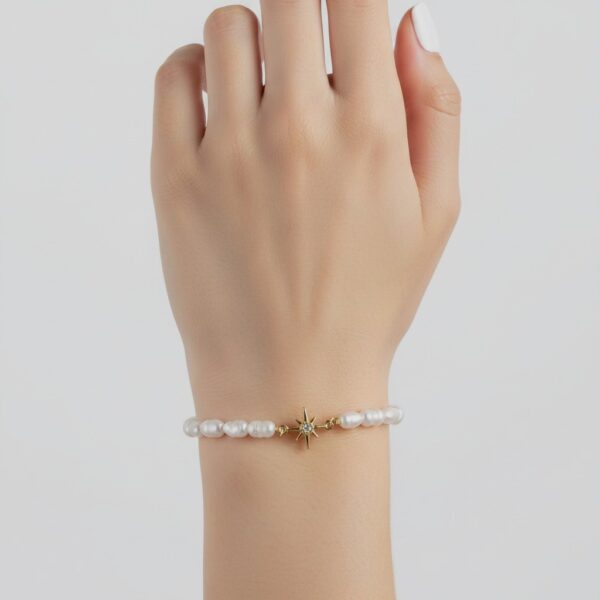 Bratara cu perle naturale si charm stea Bratara cu perle naturale si charm stea