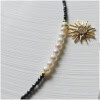 Colier cu perle si charm soare Colier cu perle si charm soare