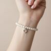 1.1 Bratara din perle naturale cu charm inima