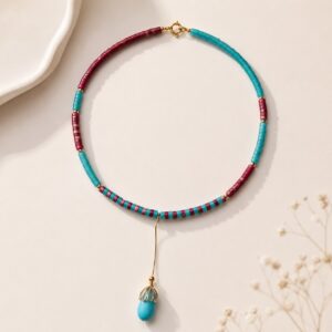 Colier choker din Turcoaz si Coral Colier choker handmade din turcoaz natural si coral cu pandantiv lacrima din turcoaz.