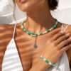 Colier din Sidef cu Turcoaze si charm spirala Colier din Sidef cu Turcoaze